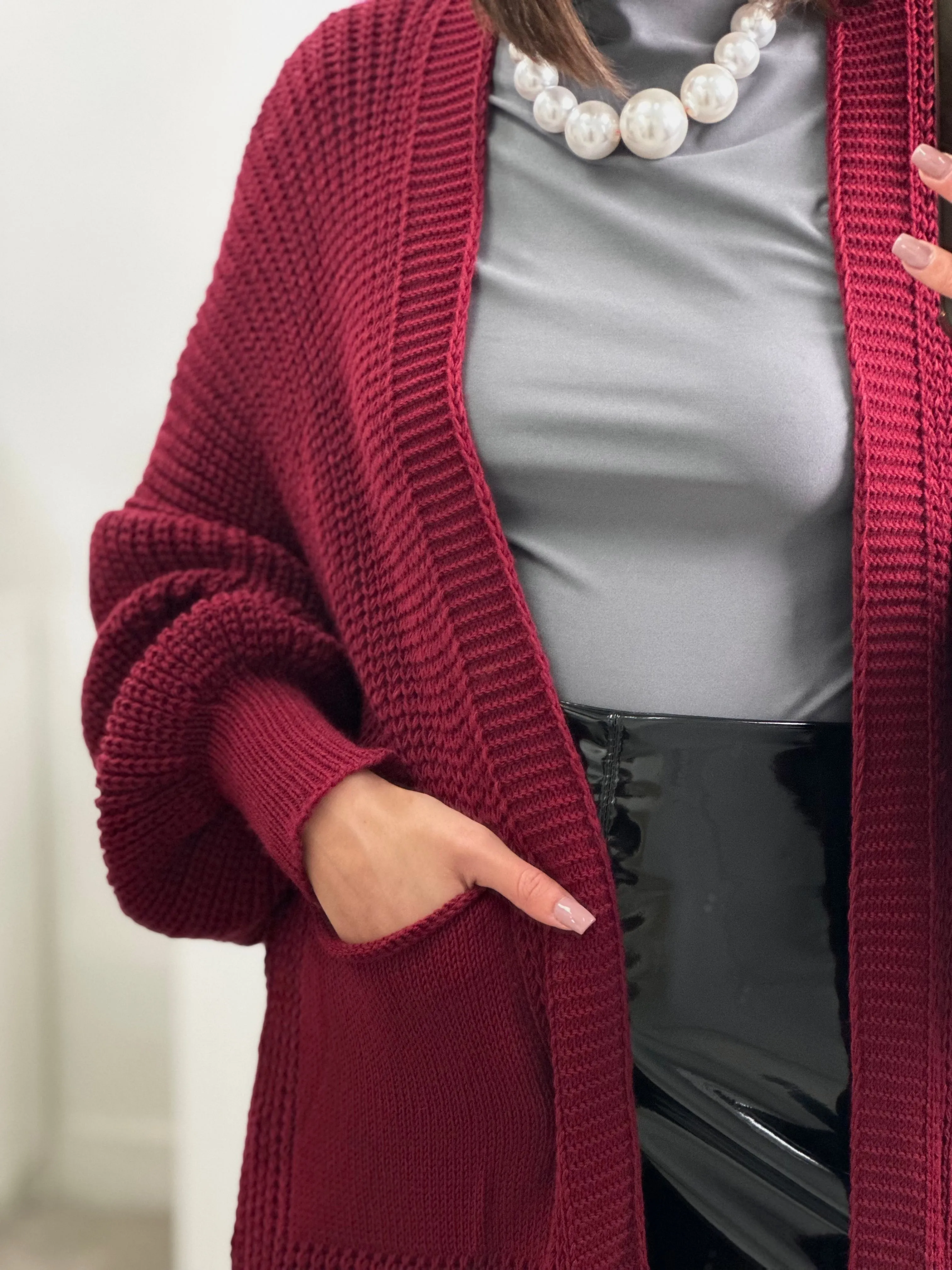 Cardigan lungo con tasche laterali